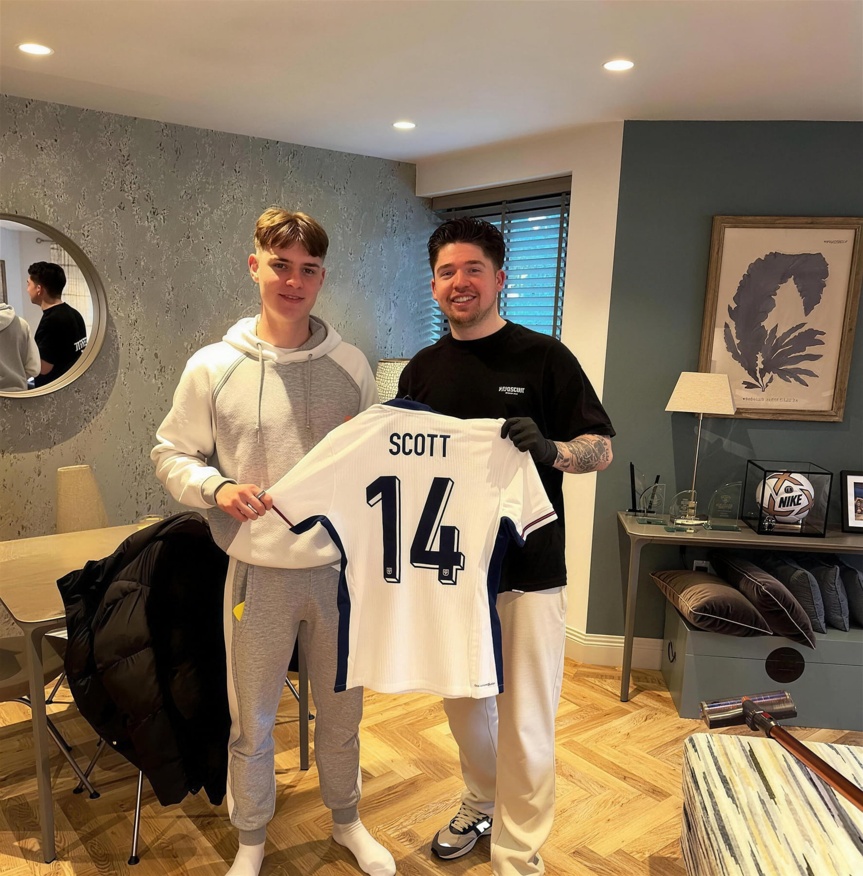 A footballer at Benny's Barbershop